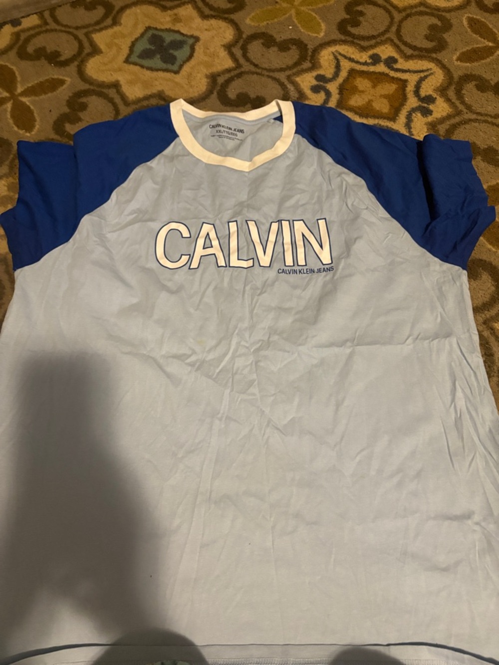 Calvin Klein Light Blue Tee with Royal Blue Raglan Sleeves